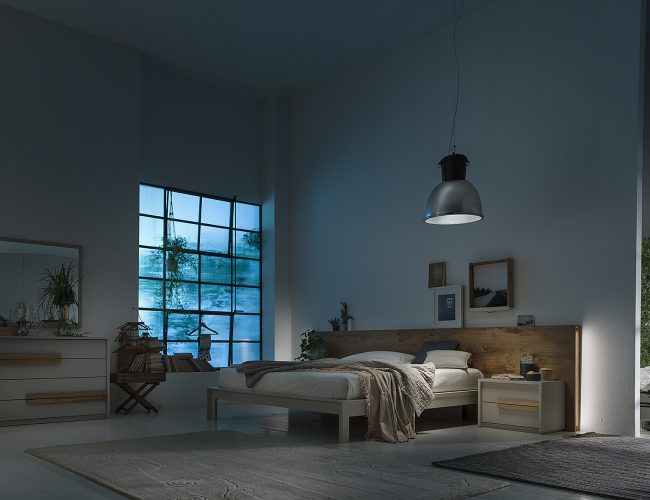 camera moderna con letto particolare in legno naturale